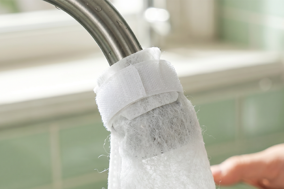 Adjustable faucet strap